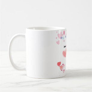 A girl points to a heart and the words: You are he Kaffeetasse