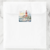 A Lighthouse in Winter Quadratischer Aufkleber (Tasche)