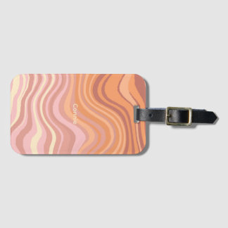 A luggage tag with sunset colors in waves. gepäckanhänger
