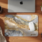 A luxurious gold and white marble background mousepad