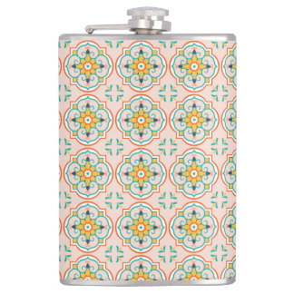 A metal flask with a colorful, symmetrical pattern flachmann