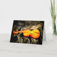 A musical birthday card with a violin
