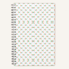 A notebook with a spiral binding features a white  notizblock