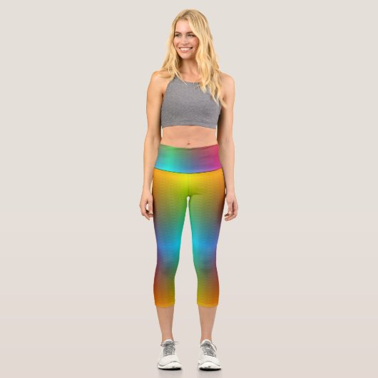 A person wearing vibrant, rainbow-gradient legging (Vorderseite)