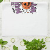 A playful design featuring a pumpkin witch with a geschirrtuch (Gefaltet)