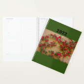 a roses climb on a brick wall on planner planer (Anzeige)