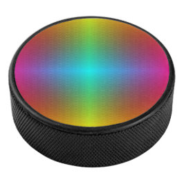 A round, multicolored object with a glossy eishockey puck