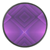 A round purple hockey puck with a geometric (Vorderseite)