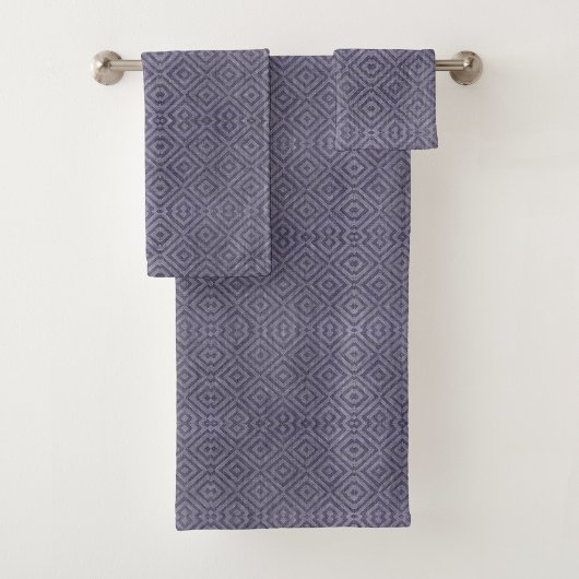 A set of purple towels with a diamond pattern