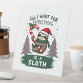 A Sloth For Christmas. Cute, Christmas Sloth With Sockelschild (In Situ)