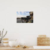 A soldier sights in to fire on a target poster (Küche)