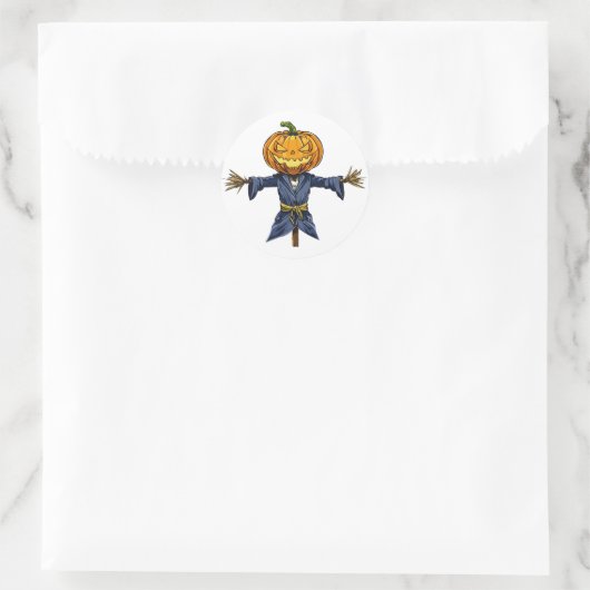 A spooky Halloween scarecrow with a glowing pumpki Runder Aufkleber (Tasche)
