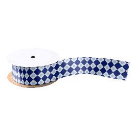 A spool of ribbon with a blue & white diamond  satinband