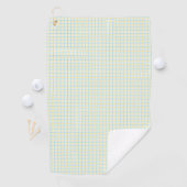 A tea towel with a grid pattern in light blue  golfhandtuch (Insitu)