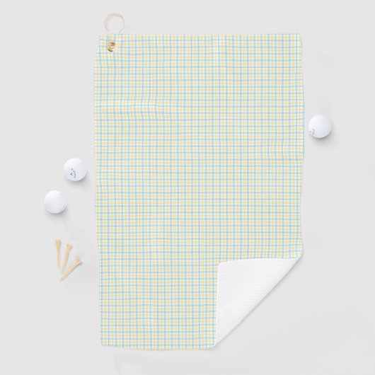A tea towel with a grid pattern in light blue  golfhandtuch (Insitu)