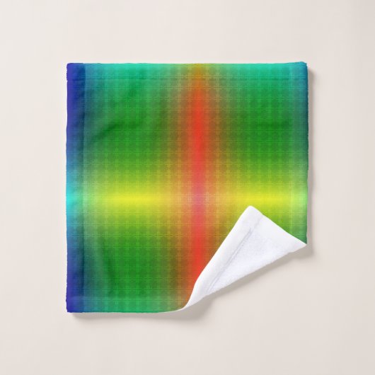 A towel set and washcloth display vibrant rainbow  (Waschlappen)