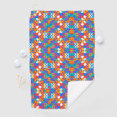 A towel with a vibrant colorful geometric pattern golfhandtuch (Insitu)