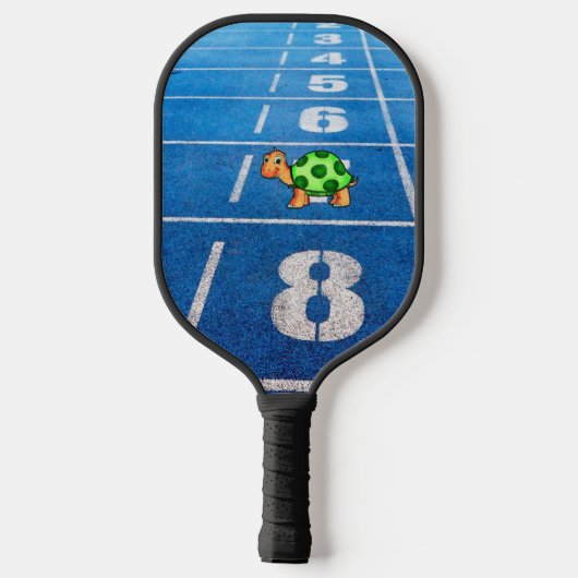 A turtle in a marathon race pickleball schläger (Rückseite)