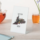 Abbildung des Cartoon der Dampflokomotive Sockelschild (In SItu)