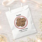Abbildung eines Chocolate Chip Cookie Cartoon Geschenktütchen (Ausgeschnitten)