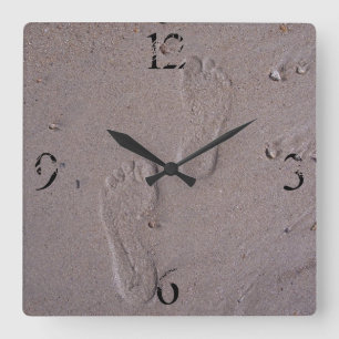 Abdrücke im Sand Quadratische Wanduhr
