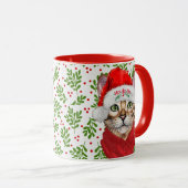 Abessinienkatze in einer Weihnachtsmannmütze mit H Tasse (VorderseiteRechts)