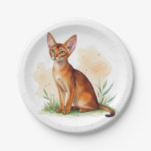 Abessinische Katze umgeben von sanften Farben und Pappteller (Vorderseite)