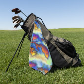 Abgetragene Wolken an orangefarbener, tropfender T Golfhandtuch (Gras)