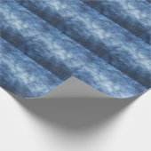Abgetragener Denim-Stoff, texturierter Hintergrund Geschenkpapier (Ecke)