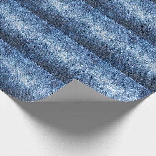 Abgetragener Denim-Stoff, texturierter Hintergrund Geschenkpapier (Ecke)