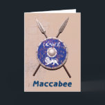 Abschirmung und Speere Feiertagskarte<br><div class="desc">Eine Darstellung eines Maccabee-Schildes und zwei Speere, die an einer Wand hängen. Schlacht getragen und rostig, aber immer noch brauchbar. Der Schild wird von einem Löwen und Text mit dem Text "Israel" (Israel) im Paleo-Hebräischen Alphabet geschmückt. Englisch Text lesen, "Maccabee" erscheint auch. Die Maccabees waren jüdische Rebellen, die Juden aus...</div>
