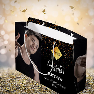 Abschluss schwarzes Gold Konfetti Foto Große Geschenktüte