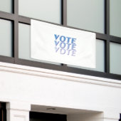 "Abstimmung" - blaue Buchstaben, weißer Hintergrun Banner (Äußeres Gebäude)