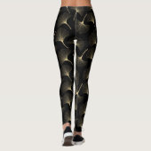 Abstrakte Blätter aus Schwarz und Leichtgold Leggings (Rückseite)