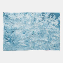 abstrakte blaue Federn und Schneeflocken