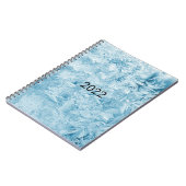 abstrakte blaue Federn und Schneeflocken Notizblock (Linke Seite)