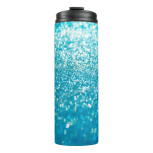 Abstrakte blaue Lichter im Hintergrund Thermosbecher
