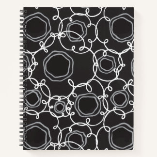 ABSTRAKTE BLUMENMATRIX IN SCHWARZ NOTIZBLOCK