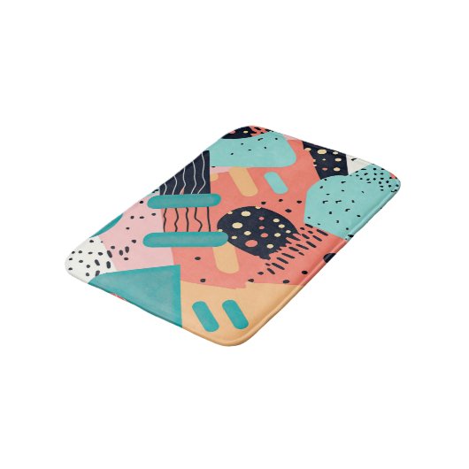 Abstrakte, farbenfrohe, funky 80er Jahre Memphis-M Badematte (Schrägansicht)