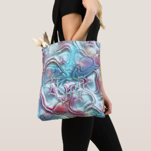 Abstrakte Formen aus Glas auf sandiger Textur Tasche