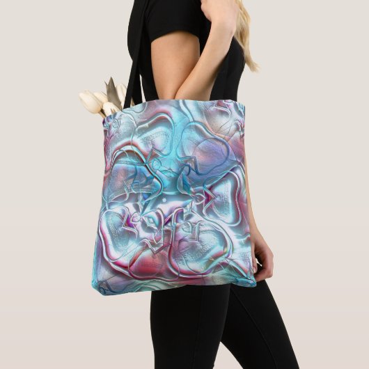 Abstrakte Formen aus Glas auf sandiger Textur Tasche (Von Nahem)