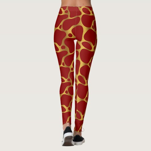 Abstrakte Giraffenmuster in Gold und Rot Leggings (Rückseite)