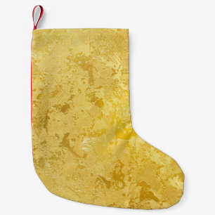 Abstrakte goldene Farbe auf Grunge rau Oberfläche Kleiner Weihnachtsstrumpf