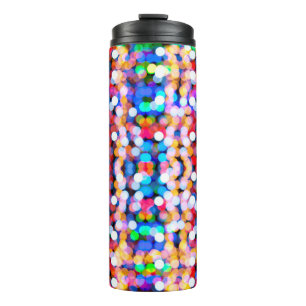 Abstrakte Hintergrundverschwommenheit von Bokeh Thermosbecher