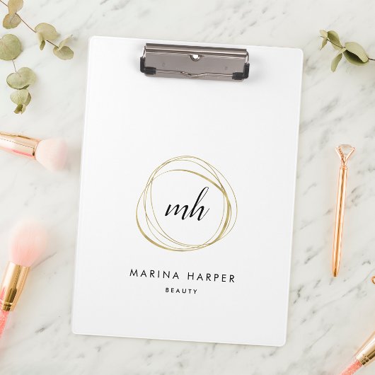 Abstrakte Imitate Gold Monogram Logo Klemmbrett