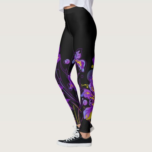 Abstrakte Iris-Blume auf schwarz-farbig Leggings (Links)