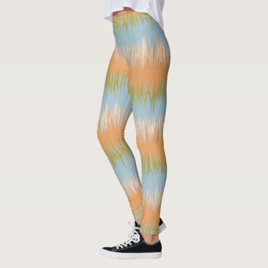 Abstrakte Leggings Streifen des orange Frühlinges (Links)