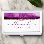 Abstrakte Lila und goldene Wasserfarbe Visitenkarten Dose<br><div class="desc">Mit unserem abstrakten lila und goldfarbenen Visitenkarten-Gehäuse heben Sie sich von der Masse ab. Das atemberaubende Aquarelldesign besticht durch eine Mischung aus tiefen Purpur und goldenen Golden, die ein raffiniertes und elegantes Aussehen schaffen, das sich perfekt für jedes berufliche Geschäft eignet. Passen Sie Ihr Design mit Ihren persönlichen Informationen an,...</div>