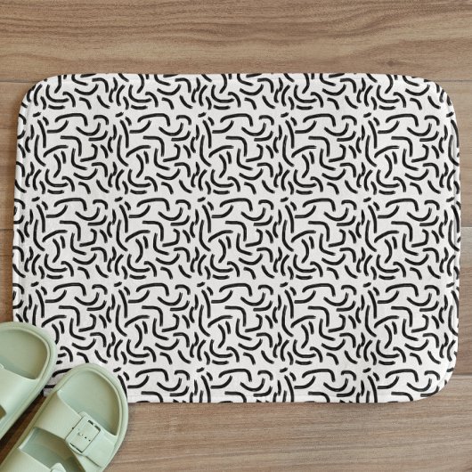 Abstrakte Linien in Schwarz und Weiß Badematte