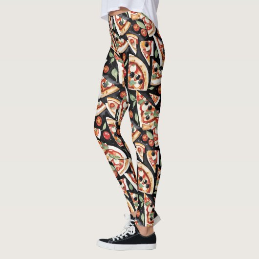 Abstrakte Pizzaslics auf schwarzem Hintergrund Leggings (Links)